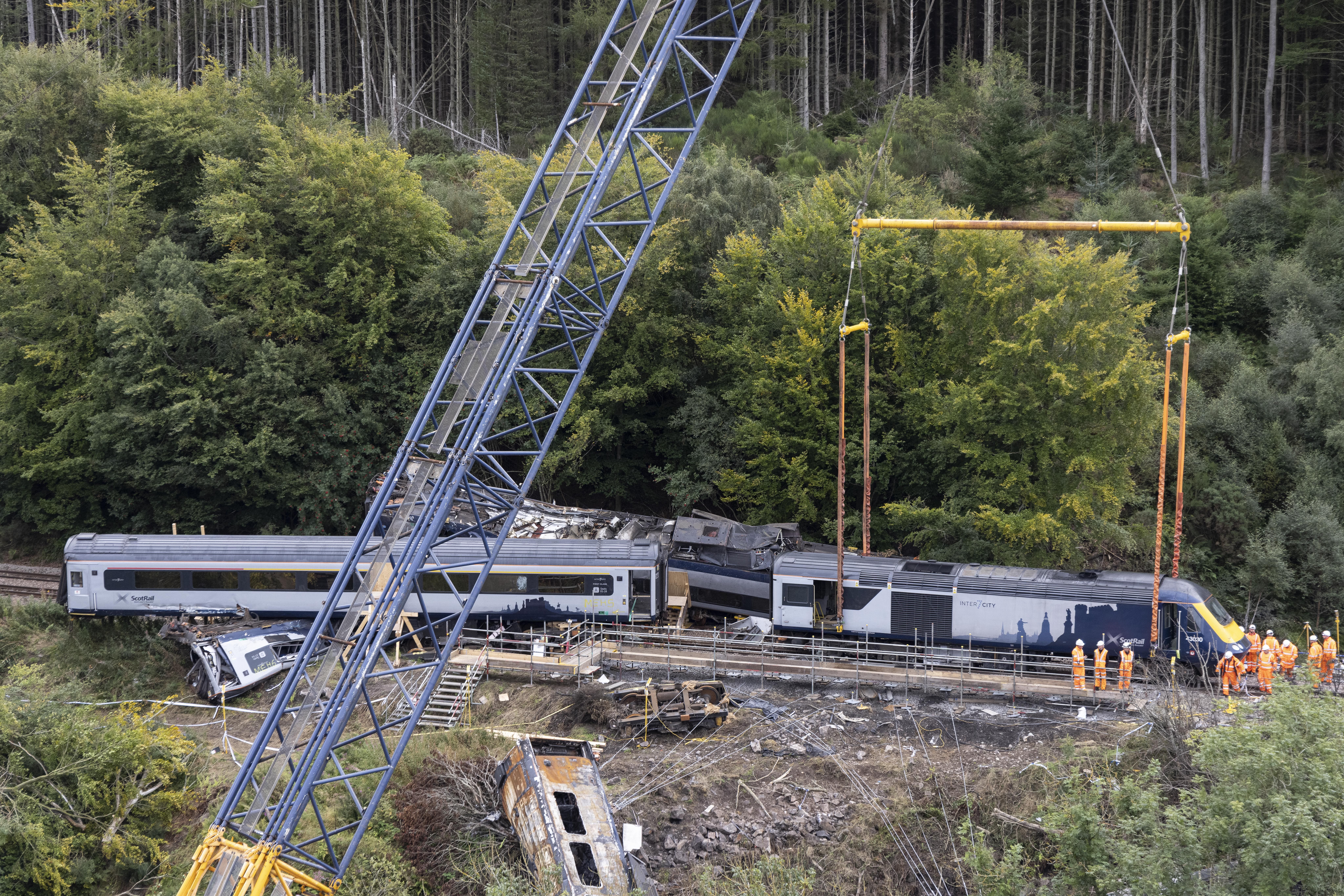 Train driver told to go at normal speed just minutes before derailment – inquiry