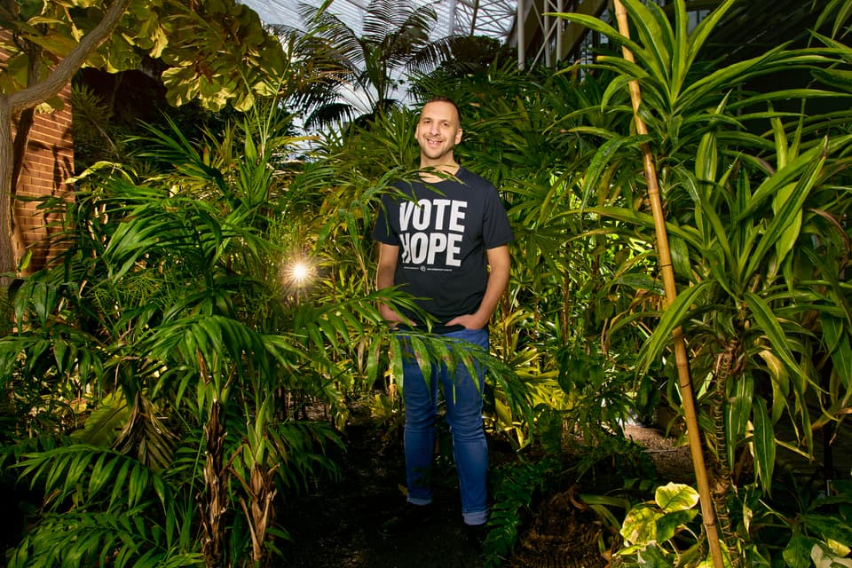 Zack Polanski wearing Vote Hope T-shirt