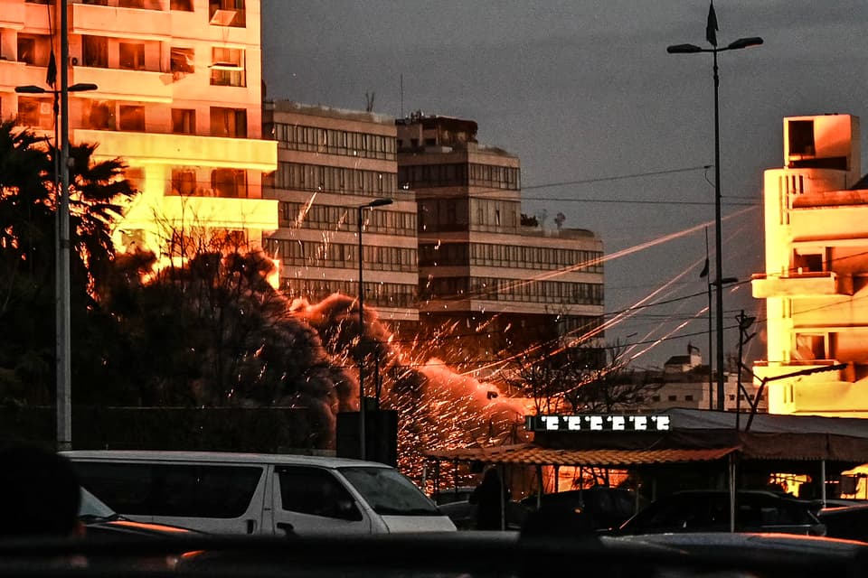 <p>A fireball erupts after Israel targeted the building in the Beirut's Bashoura neighbourhood</p>