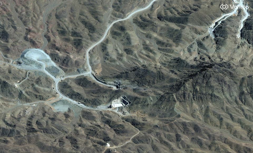 A satellite image shows an overview of the Pickaxe Mountain tunnel complex in Natanz
