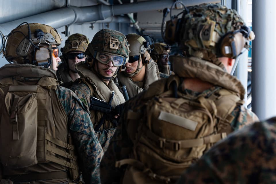 <p>US Sailors and Marines aboard USS Tripoli   </p>