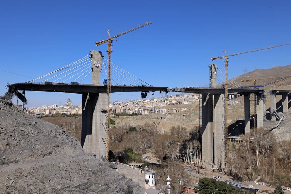 A view of the B1 bridge is pictured, a day after it was destroyed by a strike in Karaj