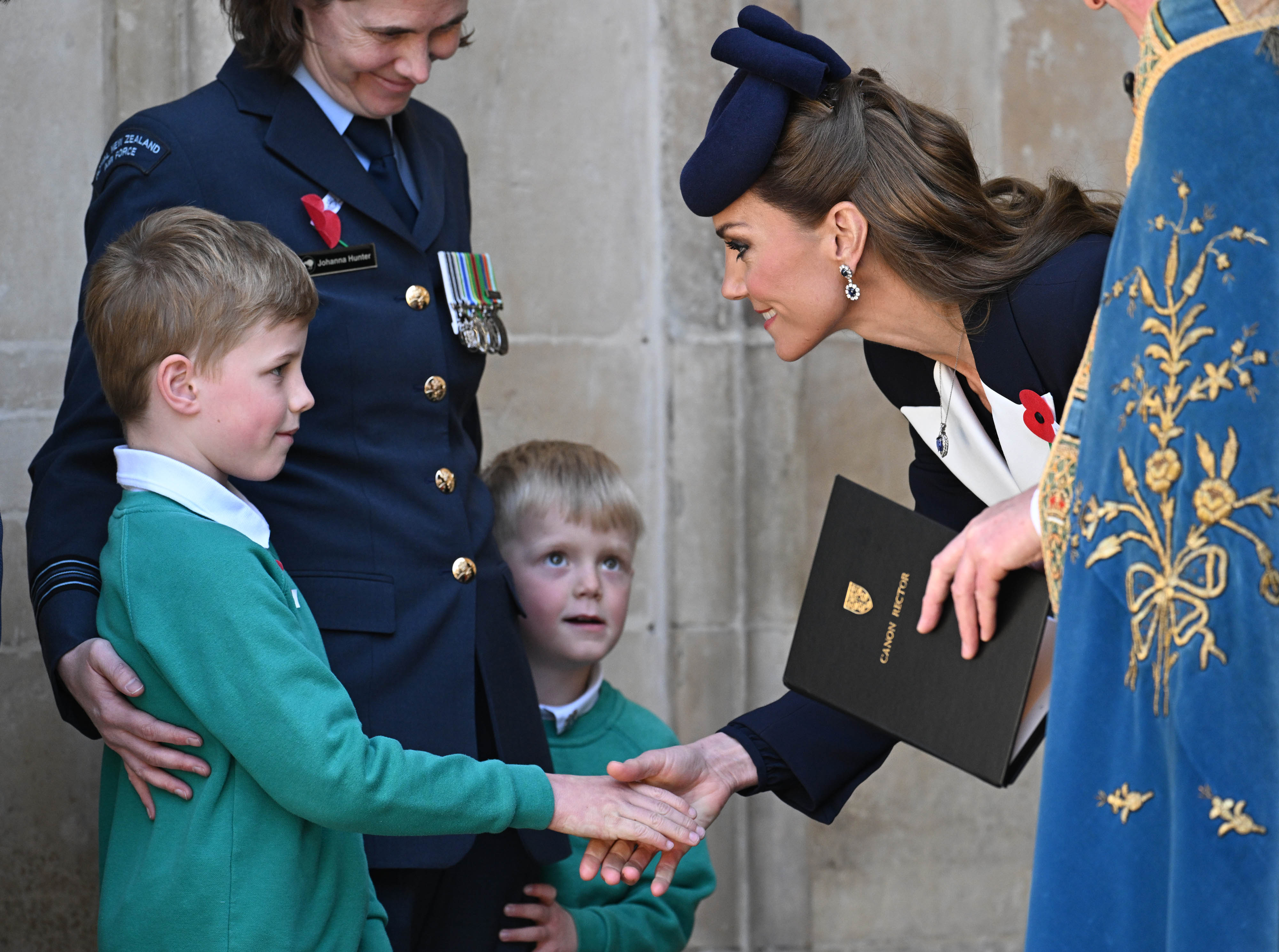 Kate greets young fan in tender moment during Anzac Day commemorations