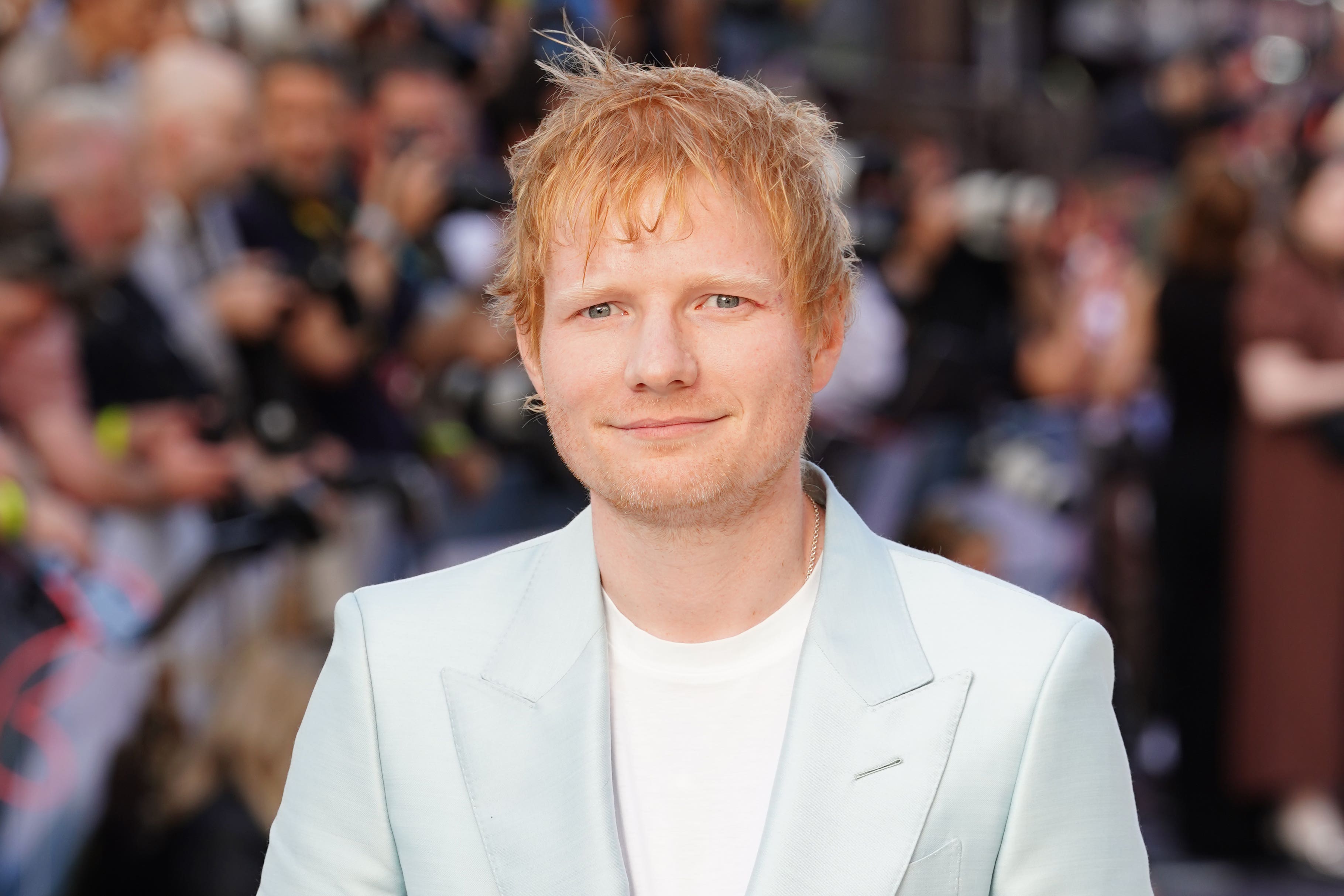 Ed Sheeran sings hit song with Ipswich players after promotion to Premier League