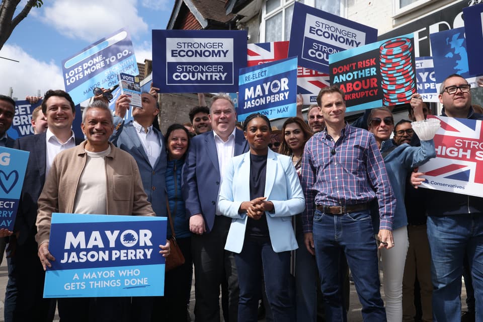 <p>LONDON, ENGLAND - MAY 06: Conservative Party Leader Kemi Badenoch (C) with Conservative Party Shadow Home Secretary Chris Philp (C-R) and Mayor of Croydon Jason Perry (C-L) </p>