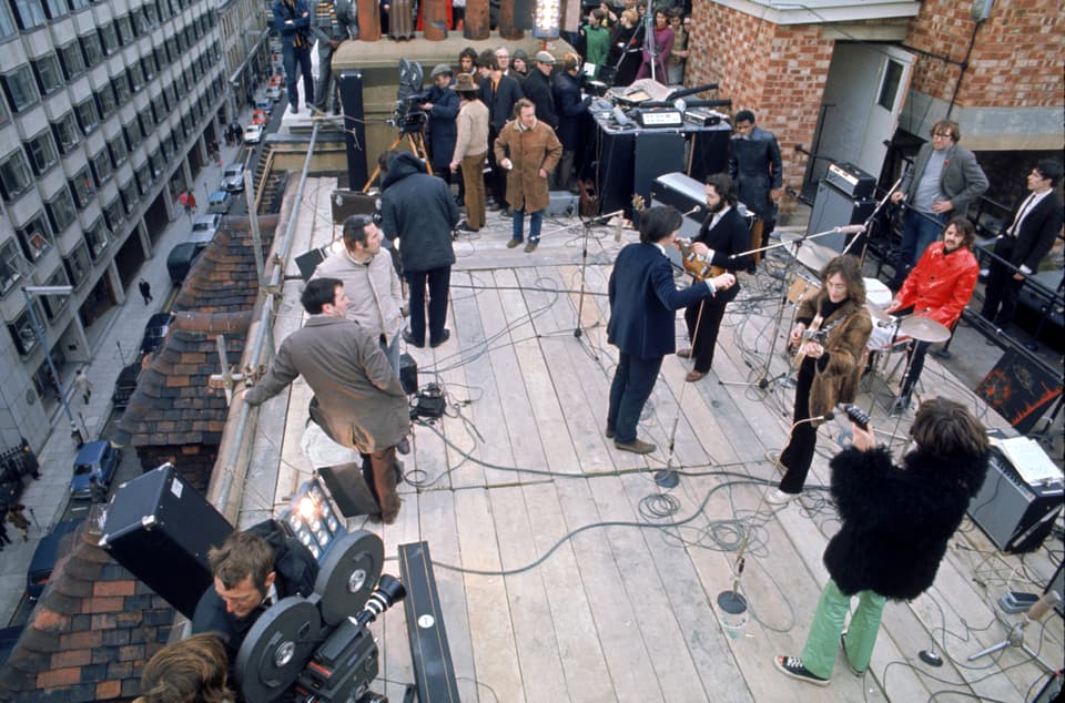 The Beatles on the roof (Apple Corps Ltd)