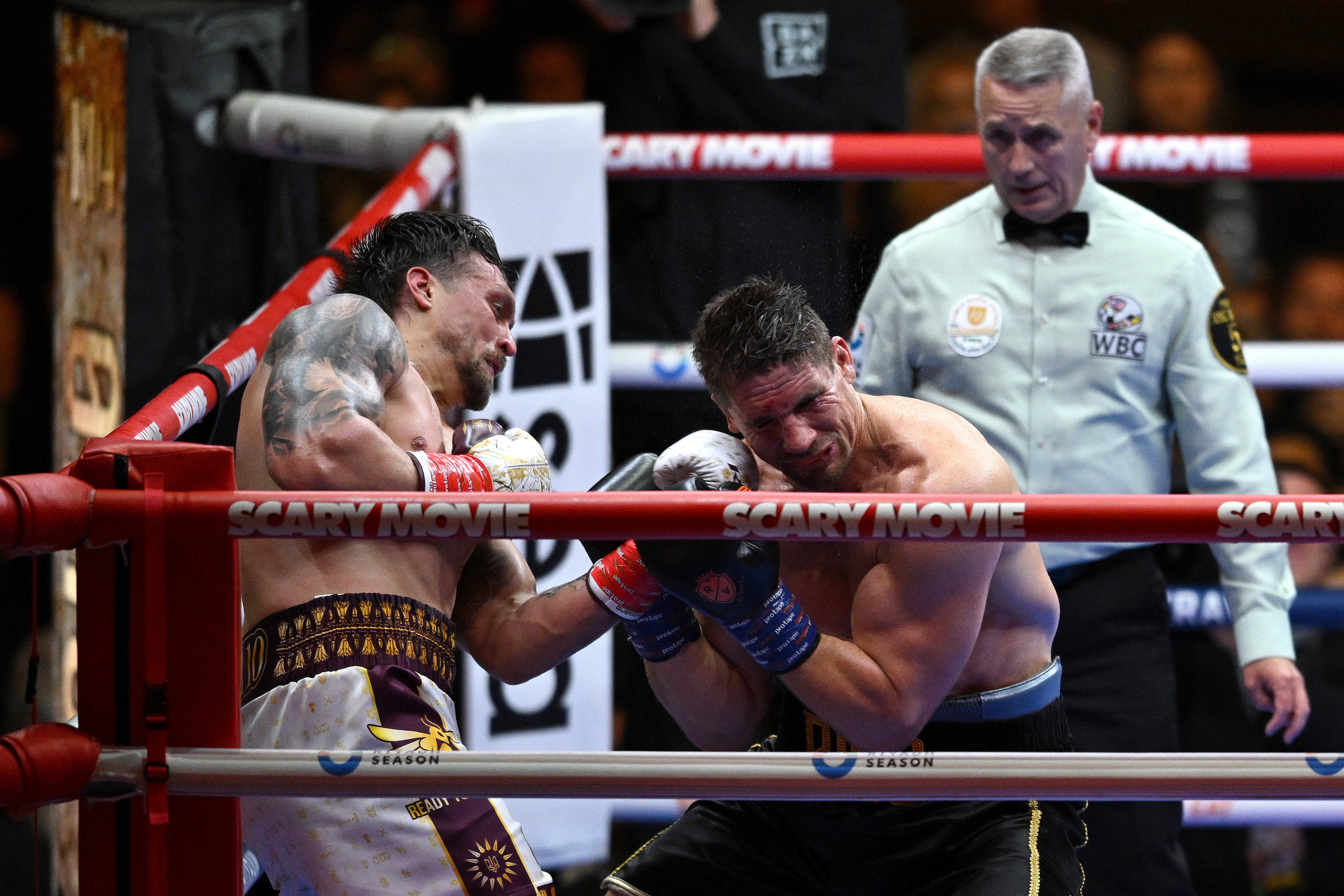 Usyk stops Verhoeven late after huge scare in controversial title fight