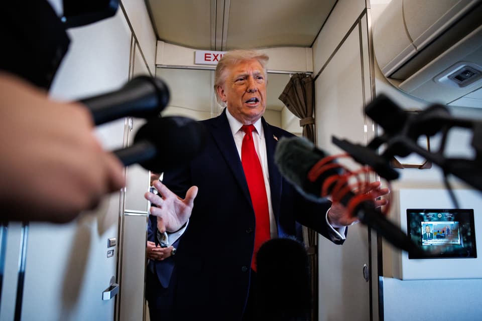 US President Donald Trump speaks with reporters while aboard Air Force One on June 5, 2026 en route to Chippewa Falls, Wisconsin.