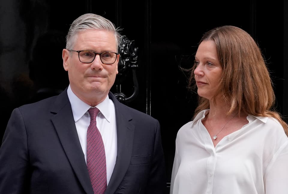 <p>Prime Minister Sir Keir Starmer and his wife Lady Victoria Starmer on the steps of 10 Downing Street</p>
