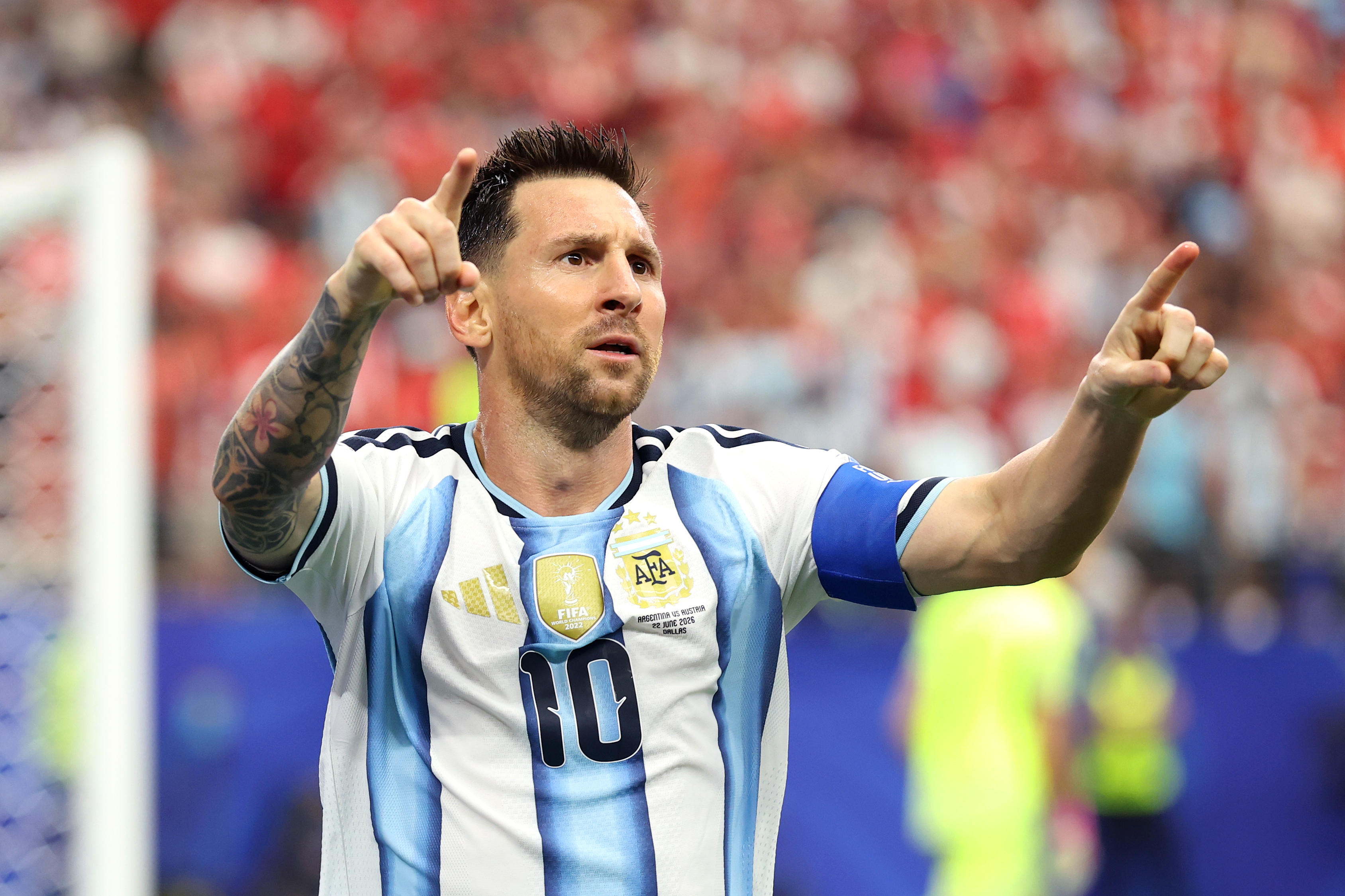 Messi makes history as Argentina sweep past Austria into knockouts