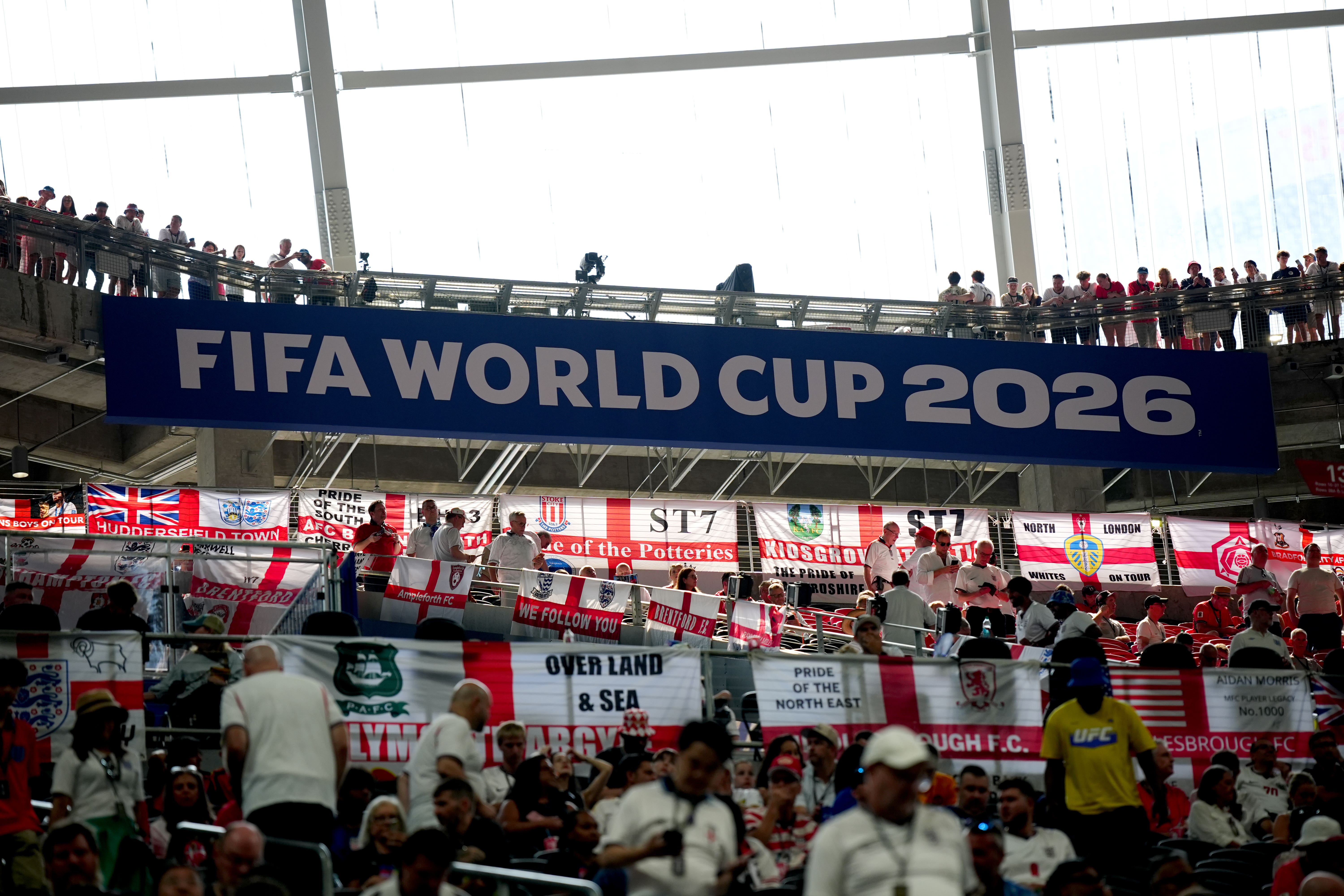 England fans slip away from work to watch World Cup battle with DR Congo