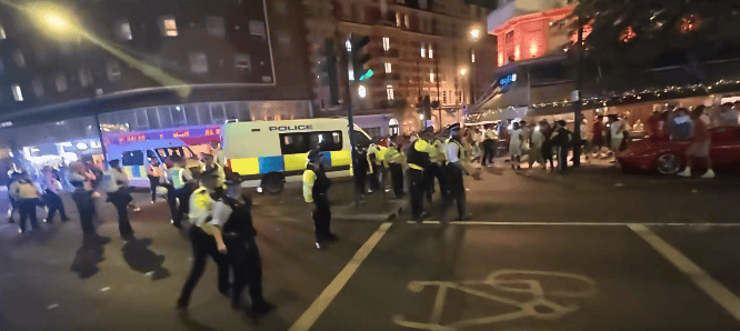 Police clash with fans on London’s Edgware Road after France beat Morocco in the World Cup quarter-finals
