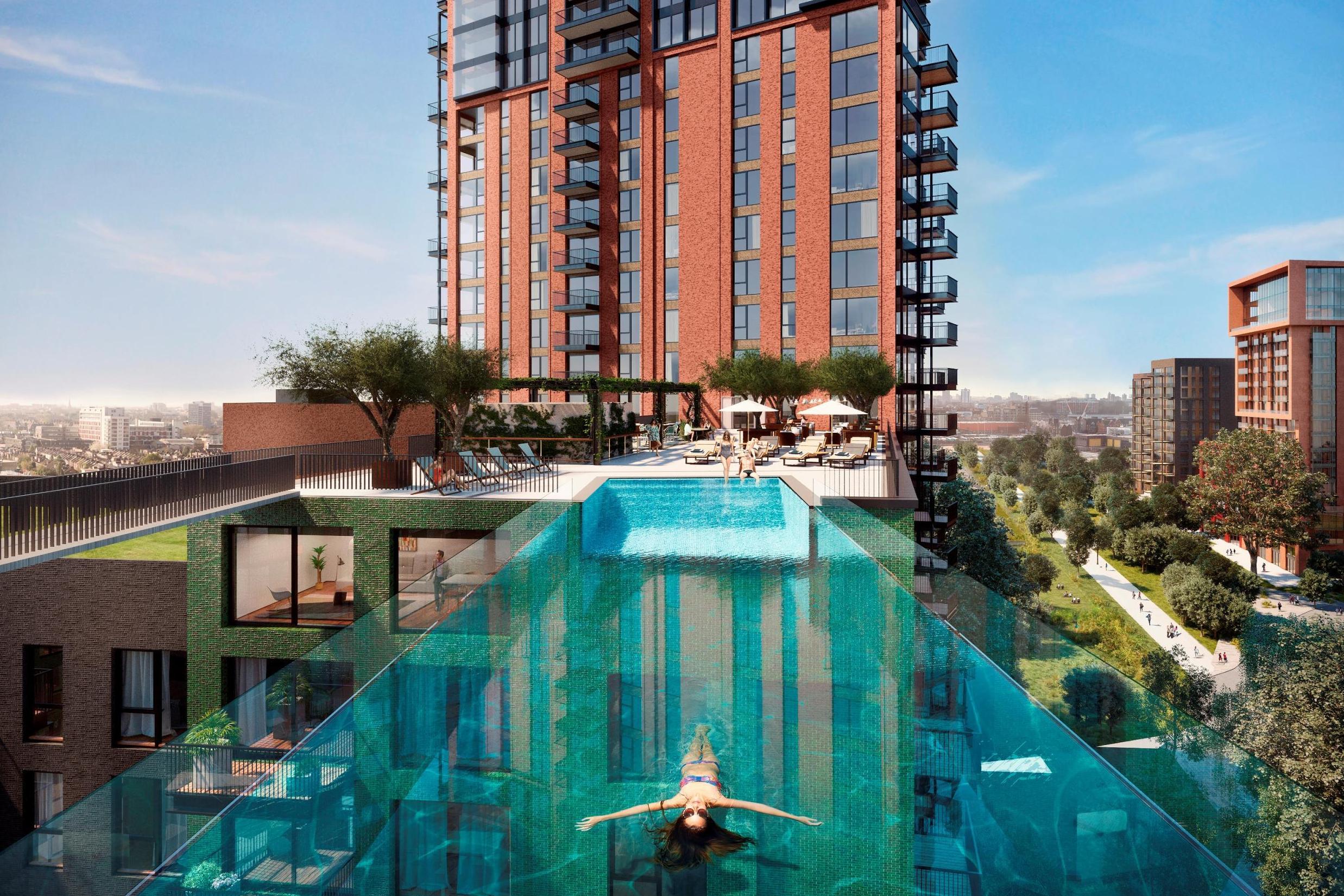 A world first: homes at Embassy Gardens in Nine Elms will overlook glass-encased outdoor "sky pool" suspended 10 storeys above ground