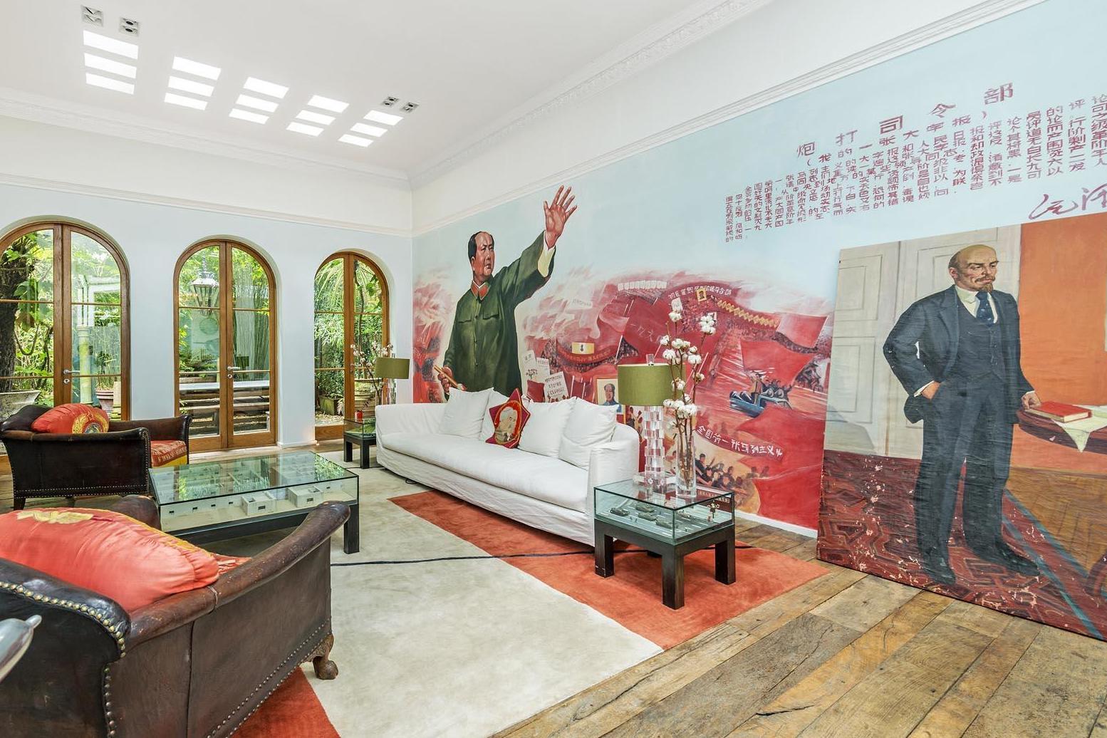 Film director's home listed for rent is covered in murals of dictators