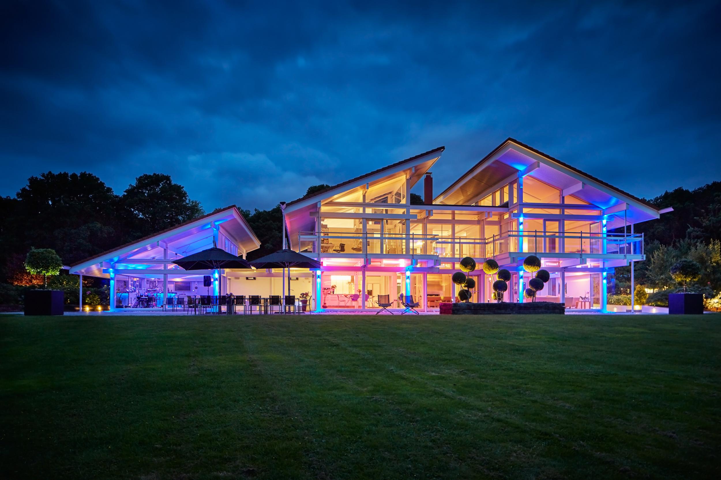 The ultimate eco-house and party palace: Huf Haus for sale in West Sussex comes with helicopter hanger and in-built karaoke machine