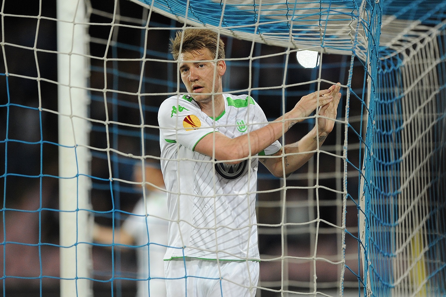 Former Arsenal striker Bendtner has Wolfsburg contract terminated