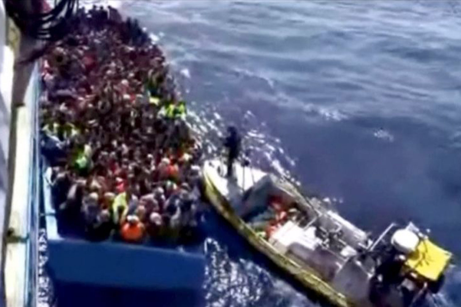 Hundreds of migrants feared dead after boat sinks off coast of Libya