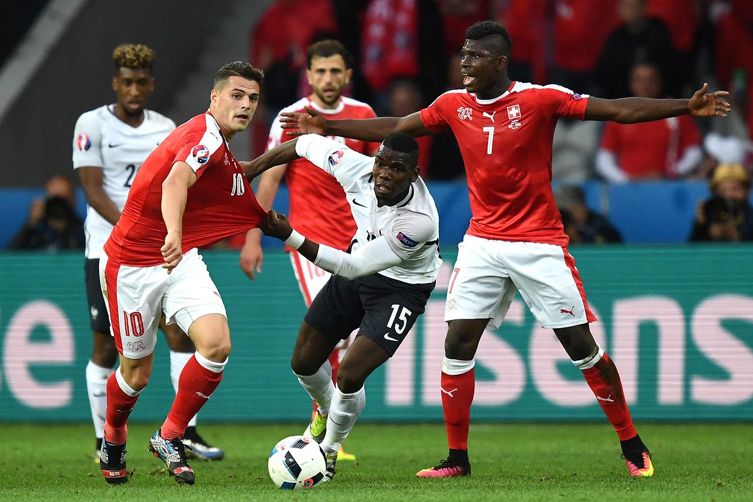 Xhaka and Switzerland progress with France draw as Payet hits bar