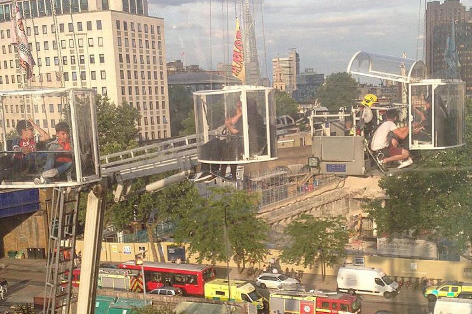 Stuck 65ft above ground: tourist's 'selfies' on board broken down ride