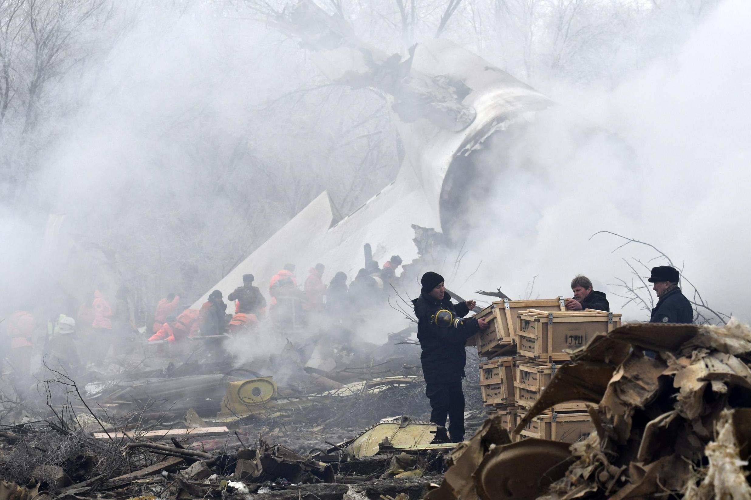 Dozens killed as plane crashes into residential area 
