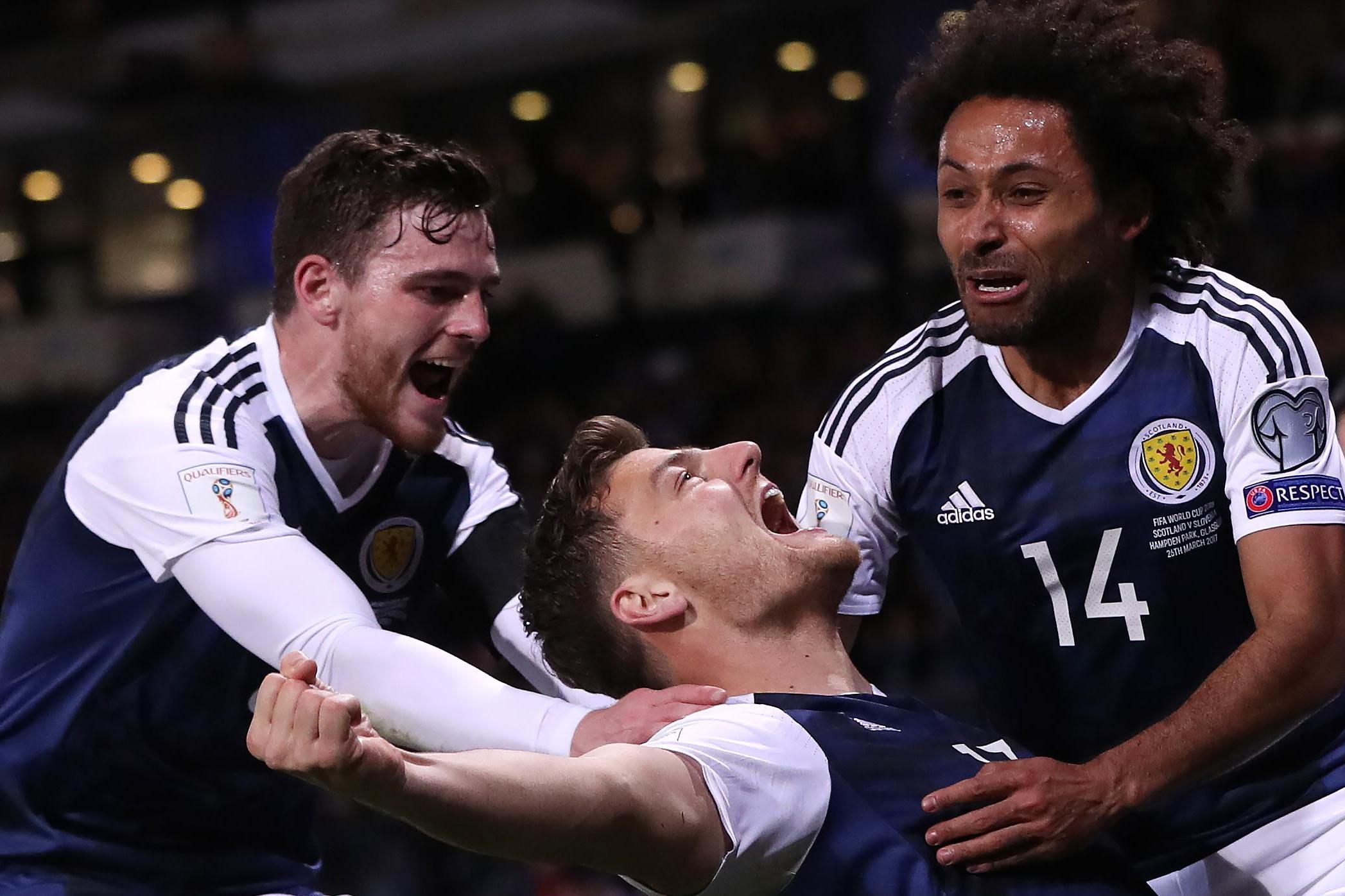 Martin ignores Scotland boos as Fulham striker saves Strachan