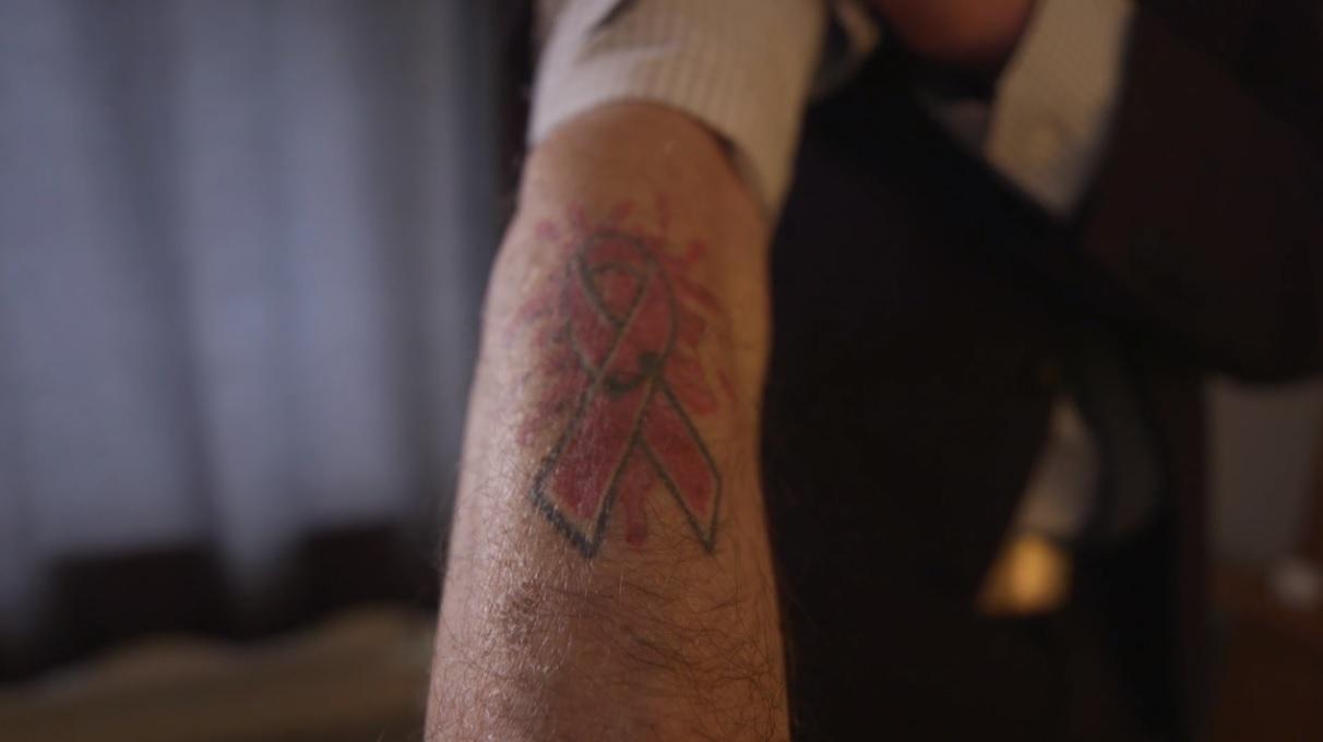 UK's longest-surviving HIV patient calls for more spending on HIV