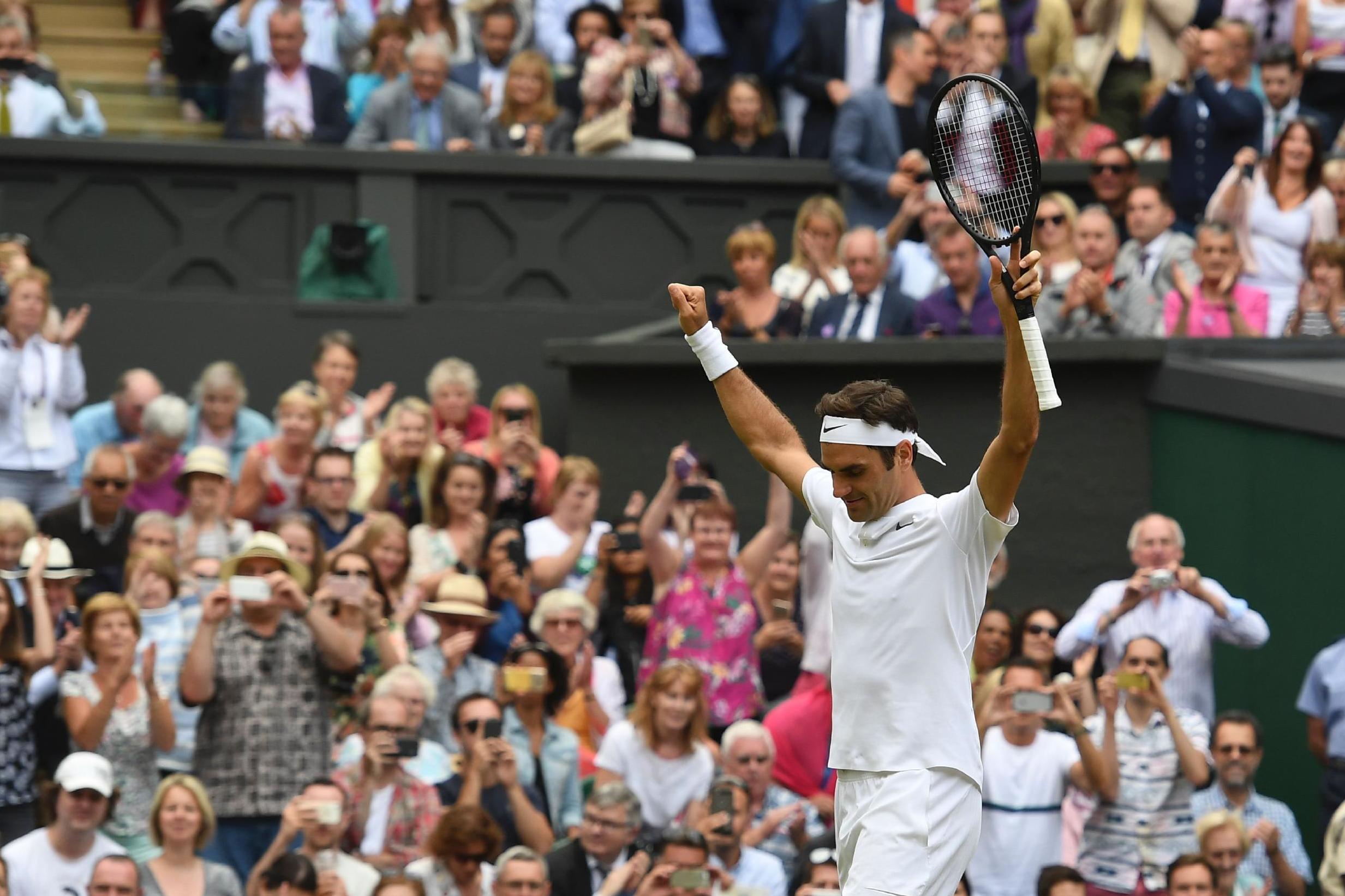 Federer reaches 11th Wimbledon final after straight-sets win
