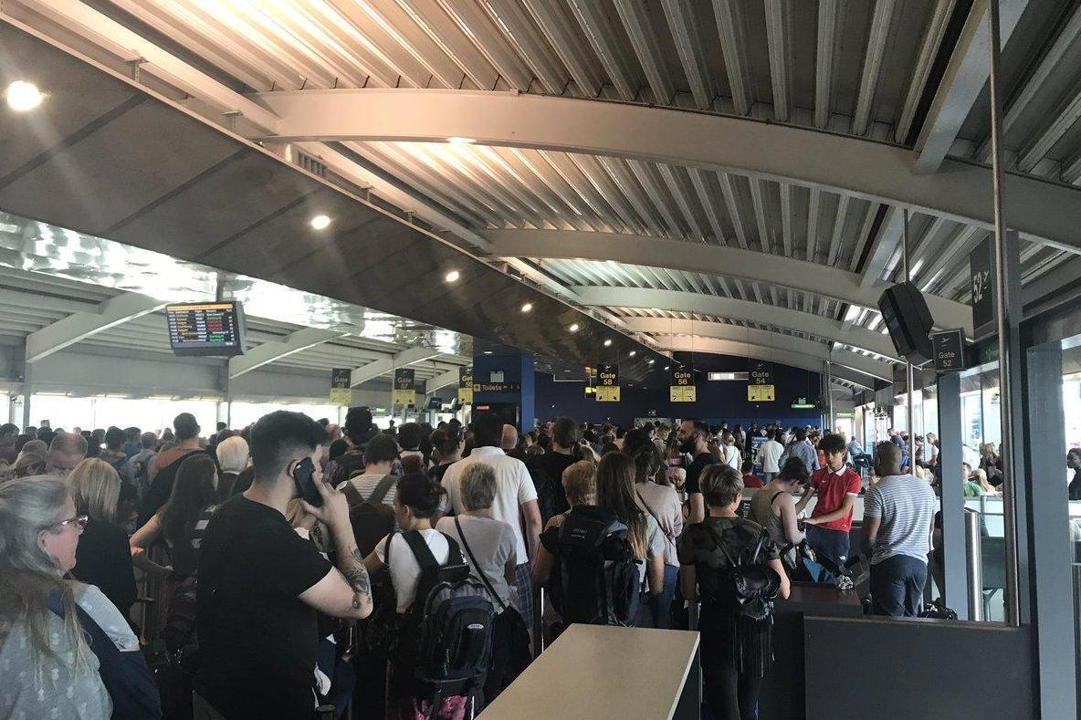 Air passengers face travel chaos after 'hole' closes runway