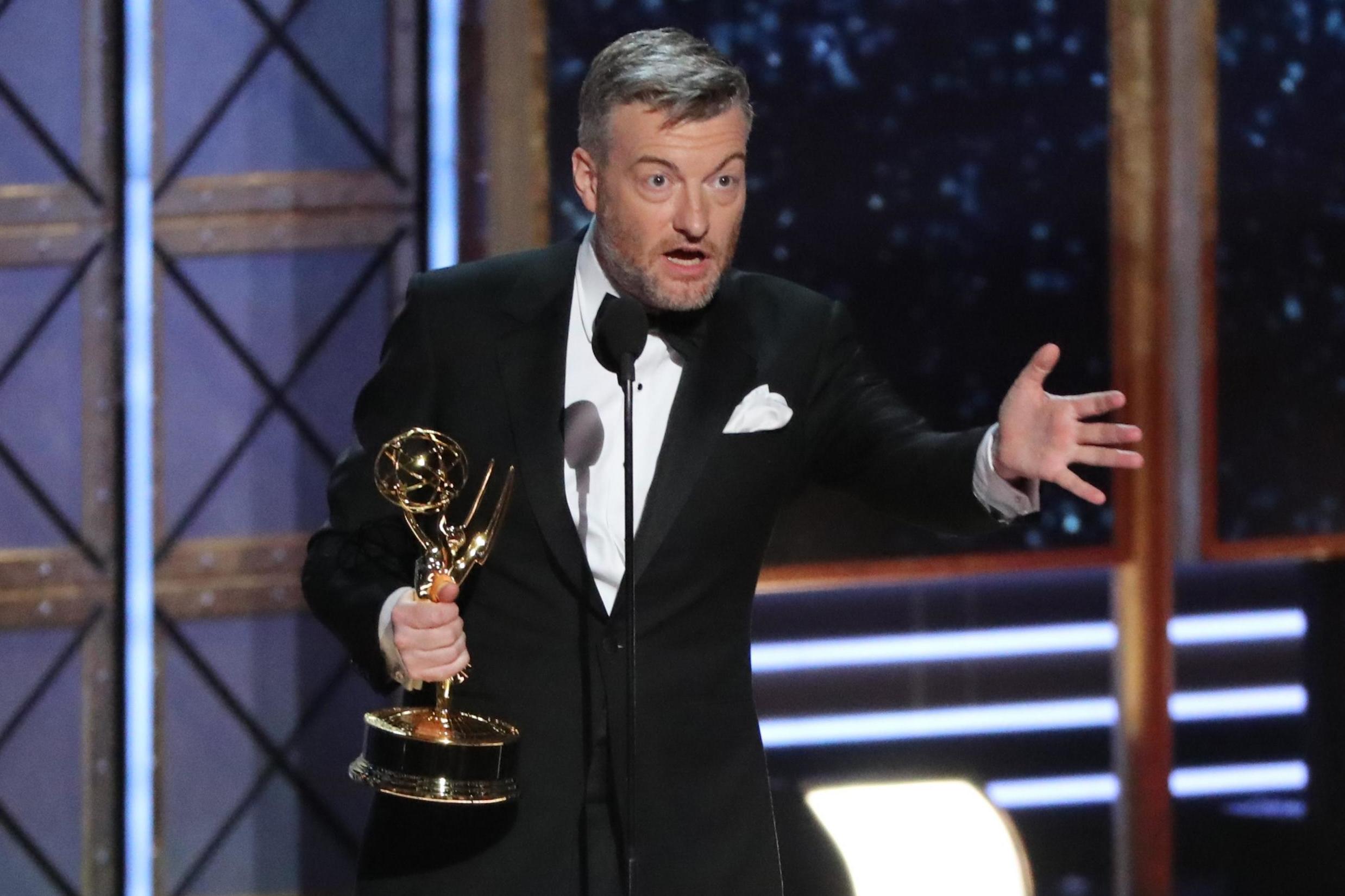 Charlie Brooker says 'love will win' as he picks up two Emmys 