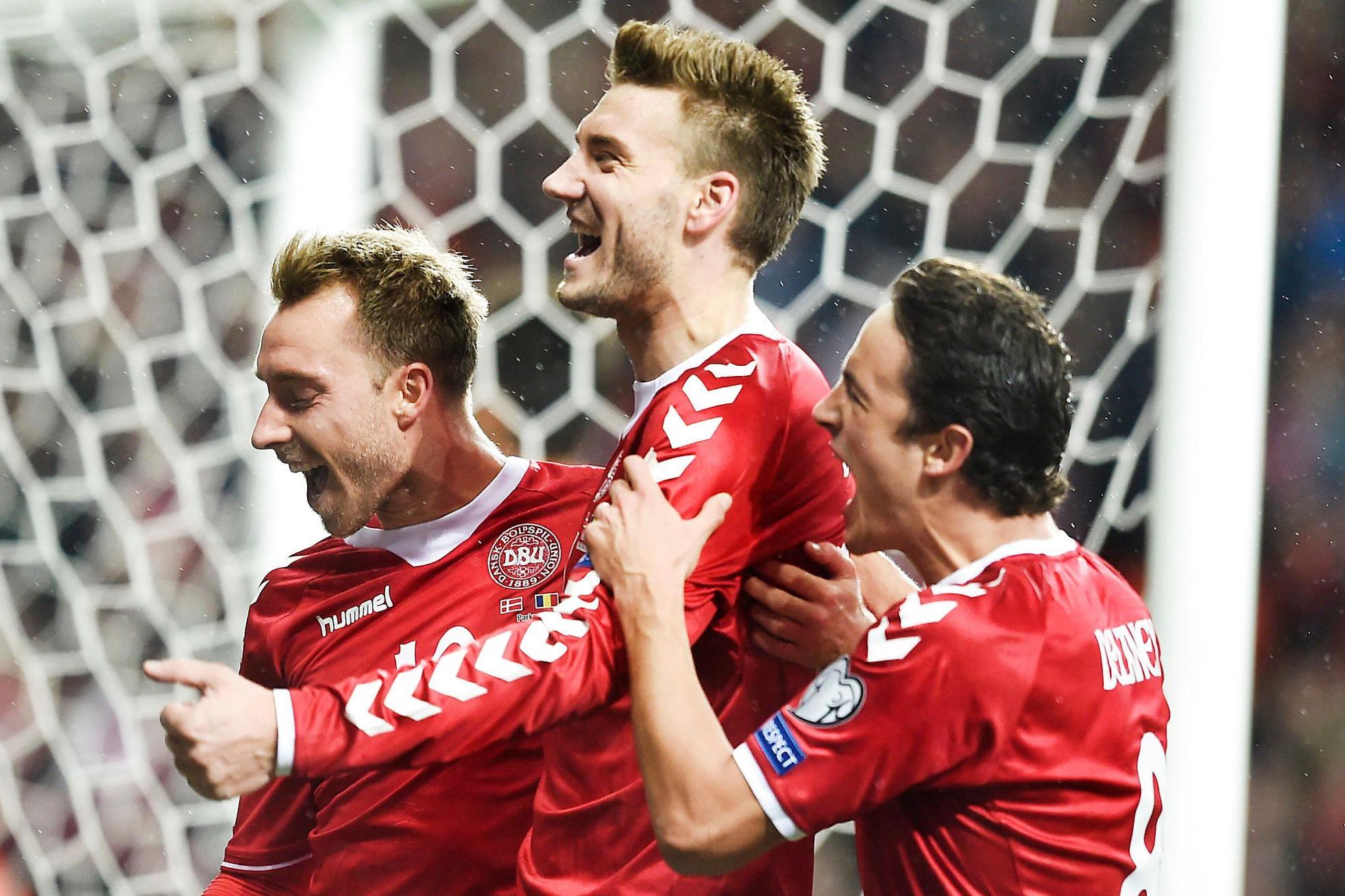 Bendtner and Eriksen seal 2018 World Cup play-off spot for Denmark