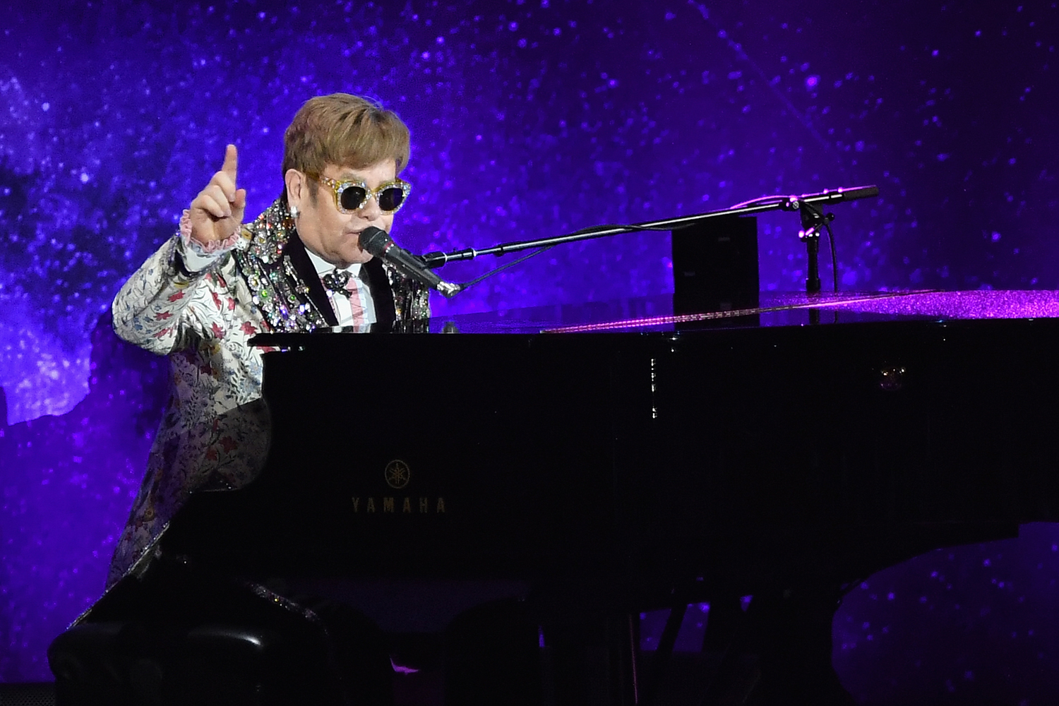Sir Elton John stops set as fan throws necklace at his face