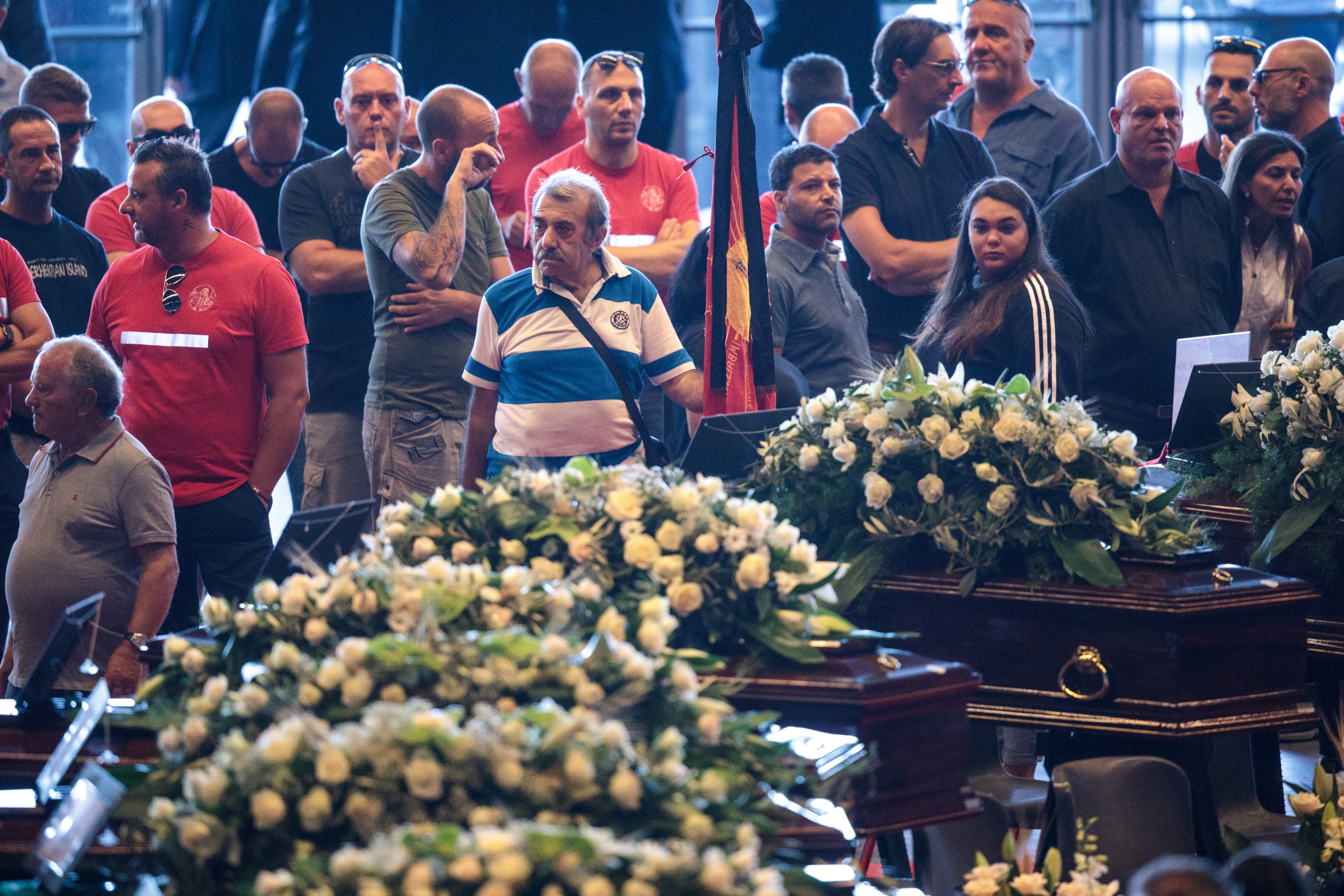 Genoa death toll rises as victims' families gather for state funeral