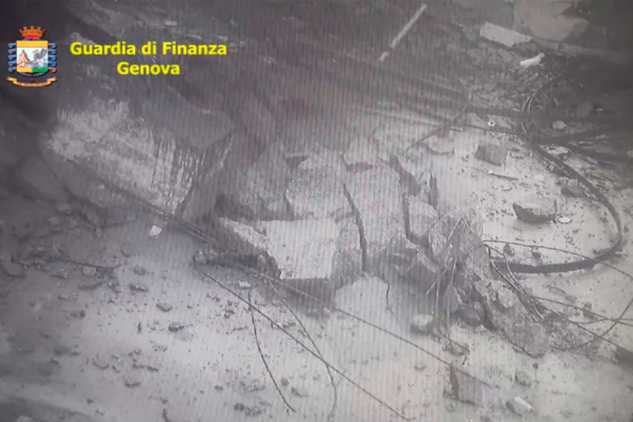 Footage shows moment Genoa bridge collapsed from road below