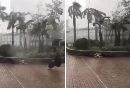 Two men swept off their feet as Typhoon Mangkhut hits Hong Kong