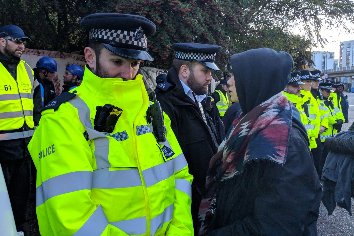 Police and protesters clash as community fight save green space