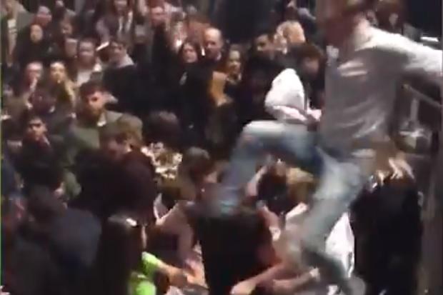 Man fly kicks woman in the face during brawl at Post Malone gig