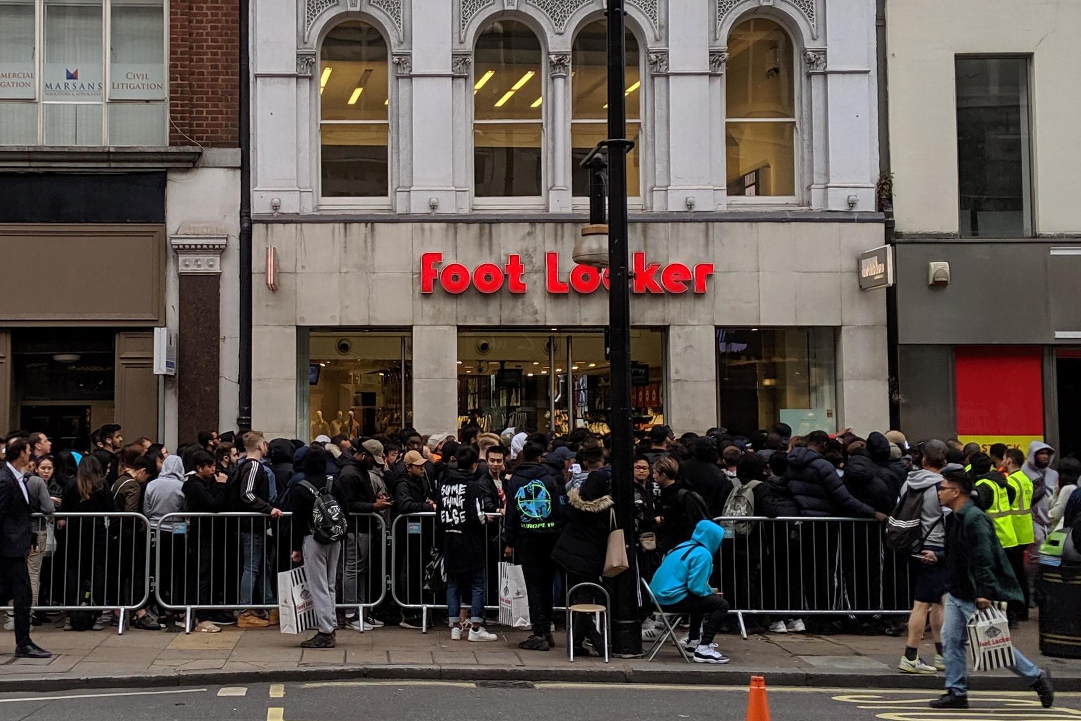Yeezy frenzy: new trainers spark huge crowds and cause website crash
