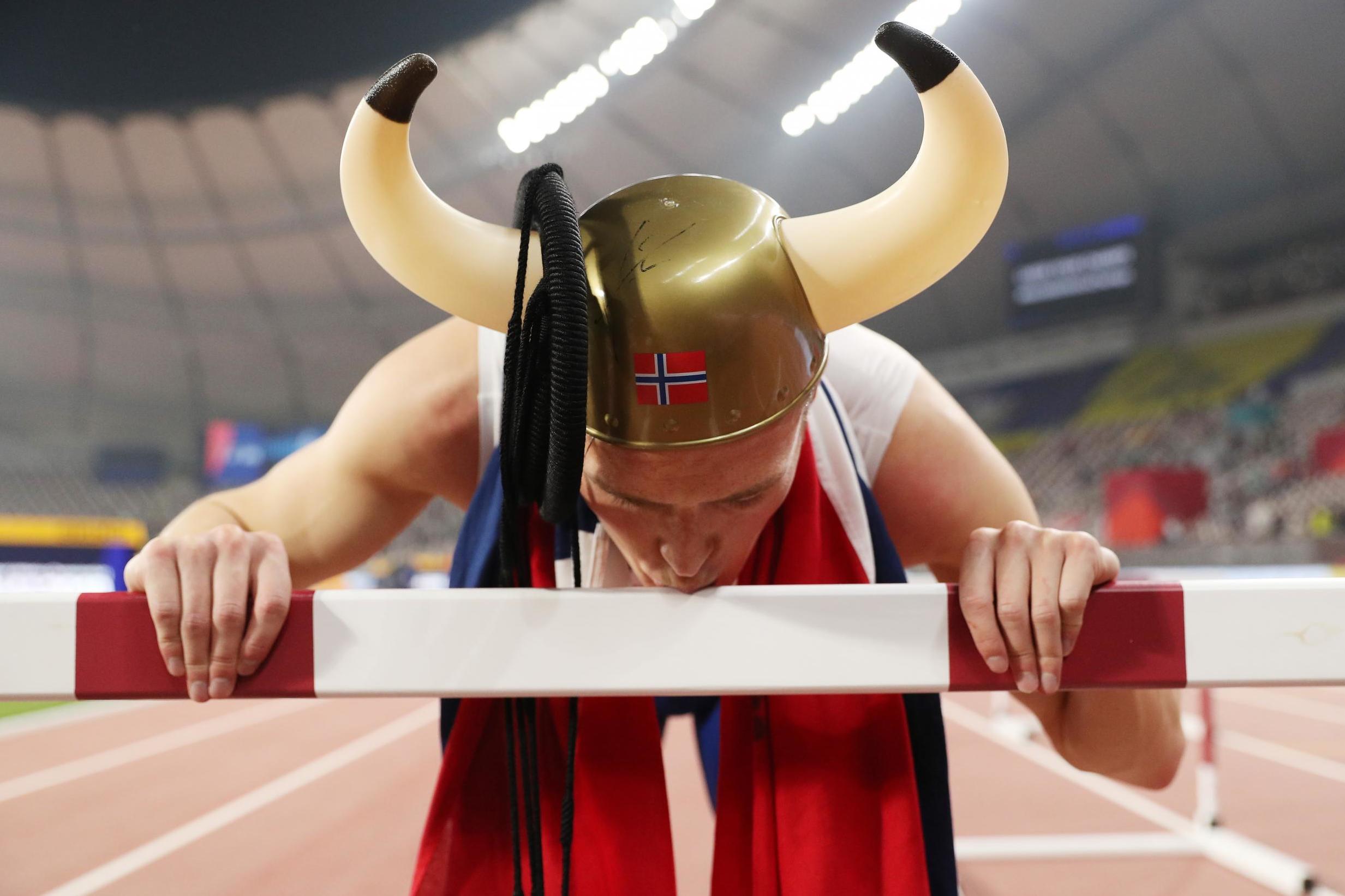Brilliant Warholm wins gold as World Championships come alive