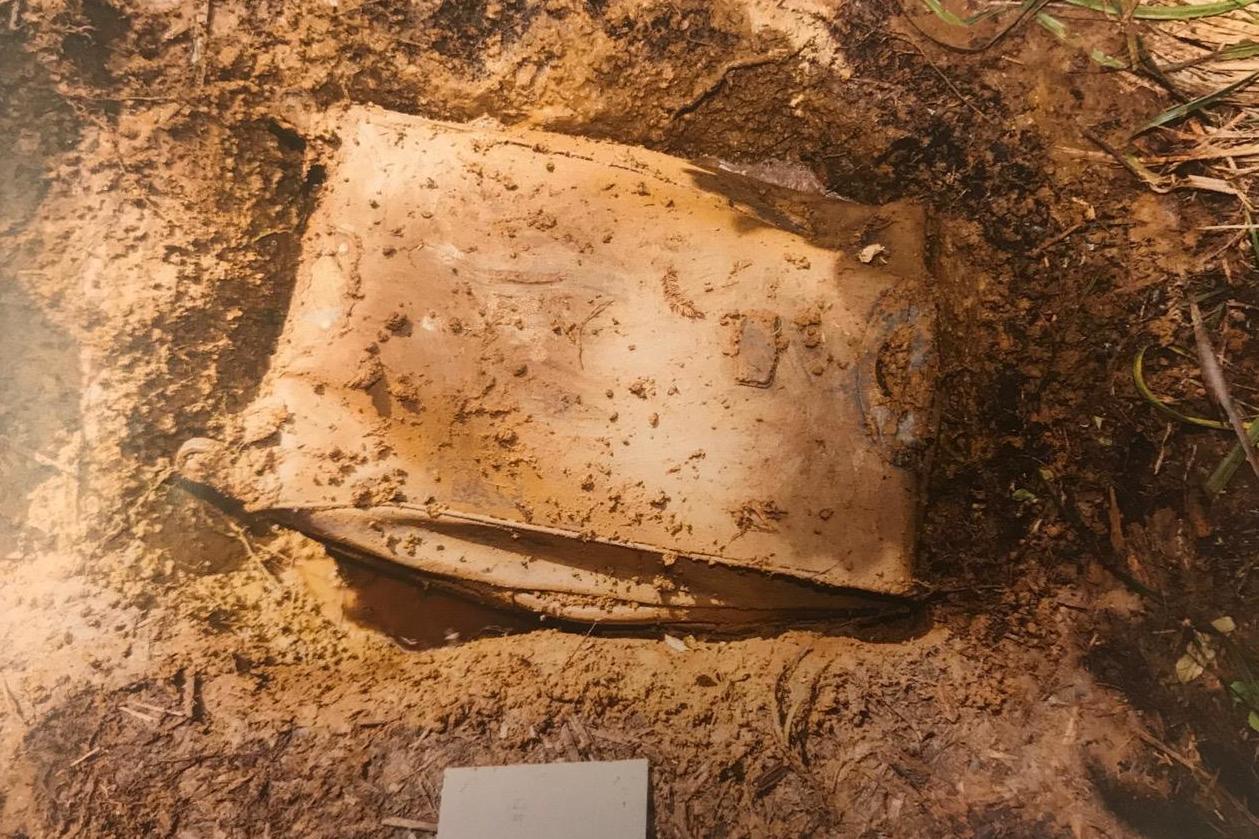 Grace's shallow grave where body found in suitcase shown to jury