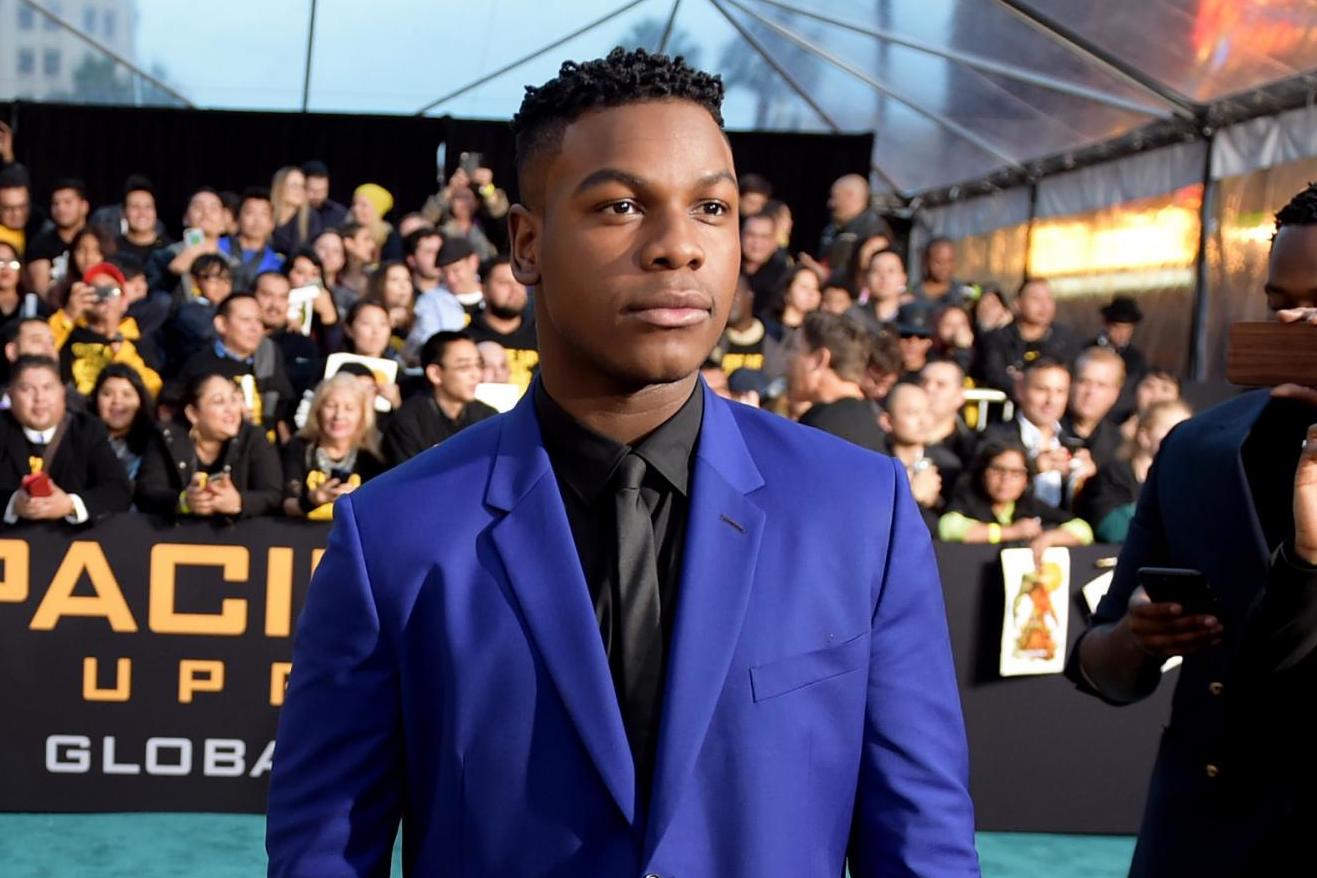 John Boyega: My father was stopped by police returning from church