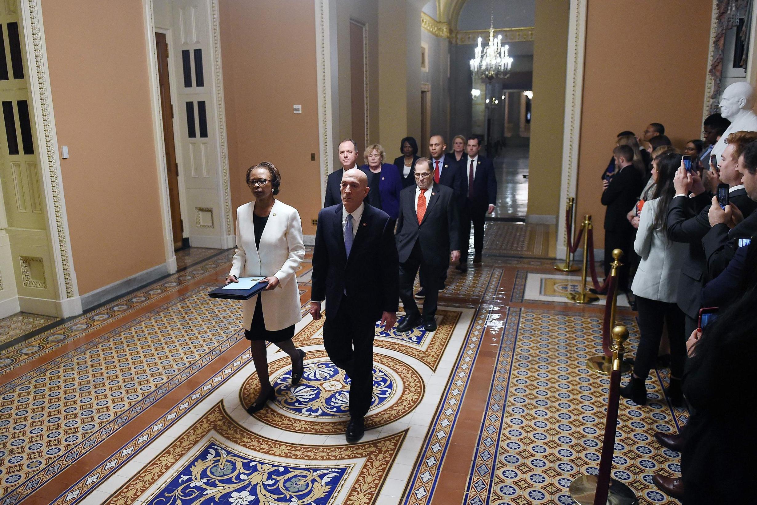 Stage set for Trump impeachment trial as articles marched to Senate