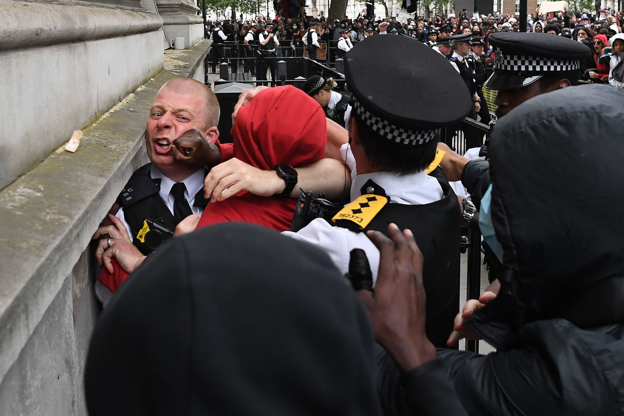 Protesters scuffle with police at London anti-racism march