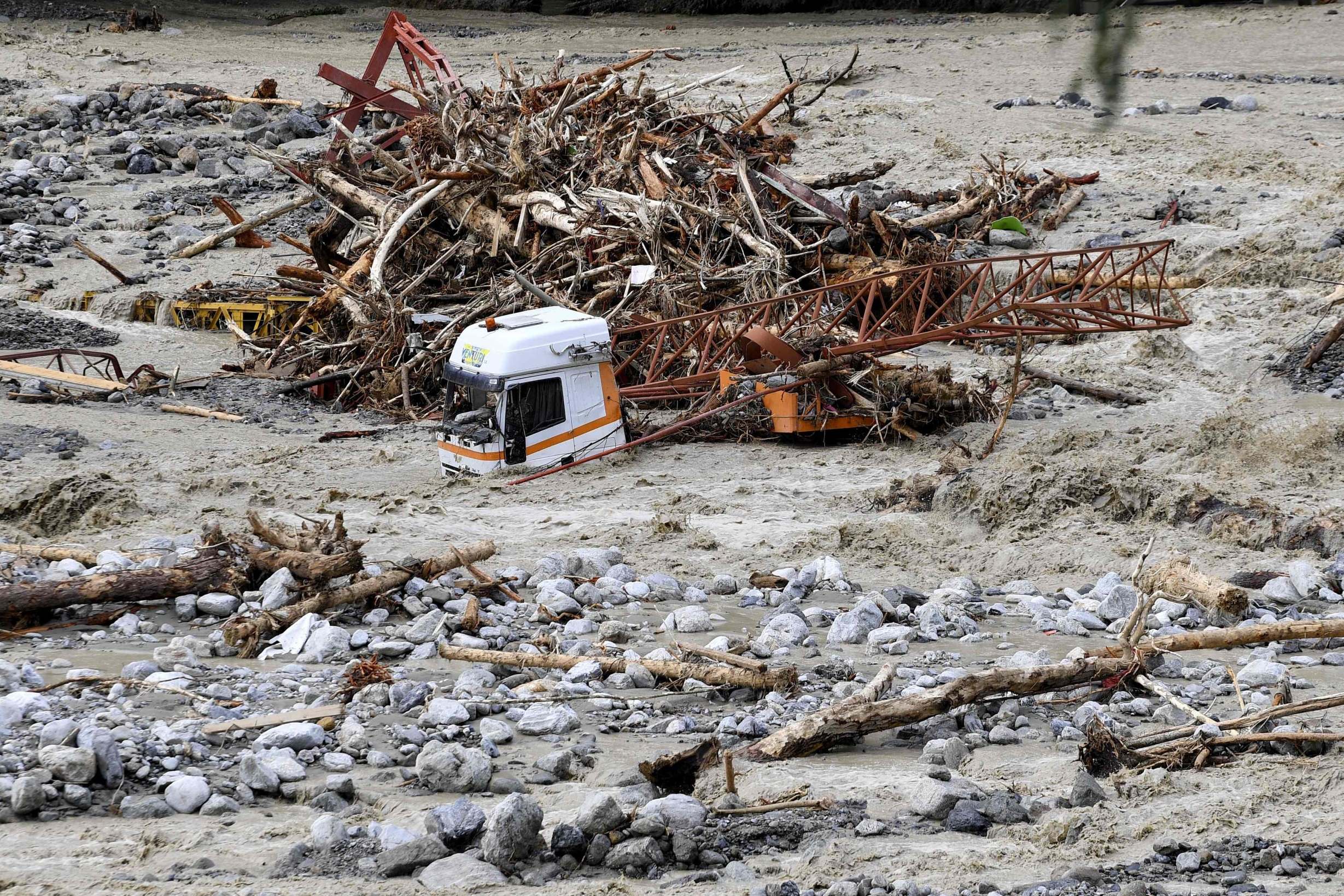 Firefighter killed and 25 missing in severe floods in Italy and France